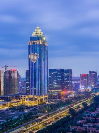 Grand New Century Hotel Haining Zhejiang Екстер'єр фото